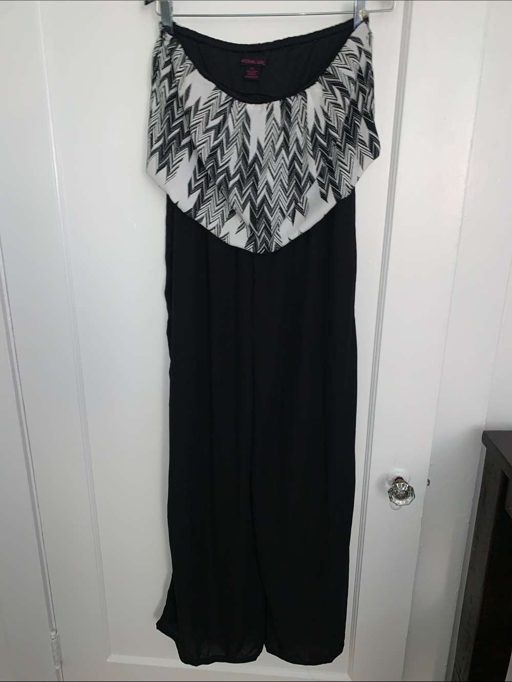 Black jumpsuit with Chevron Ruffle Detail